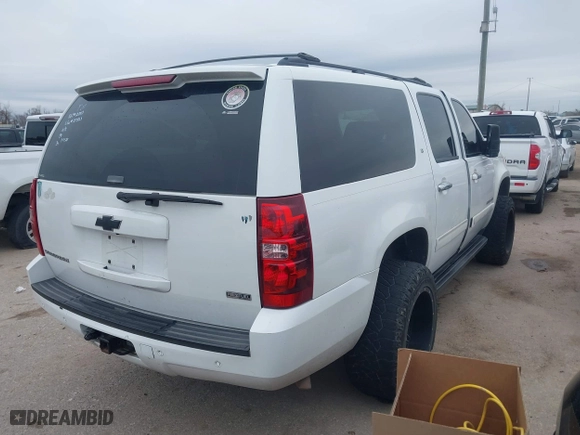 2008 Chevrolet Suburban LT w/3LT with VIN 3GNFC16048G187823, listed as a IAAI auction lot 41612832 with 244,128 mi miles. Bid and sale history available at carsss.com. Image 4.