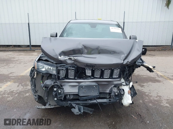 2017 Jeep Grand Cherokee Laredo with VIN 1C4RJFAG9HC885716, listed as a IAAI auction lot 41795182 with 110,613 mi miles. Bid and sale history available at carsss.com. Image 13.
