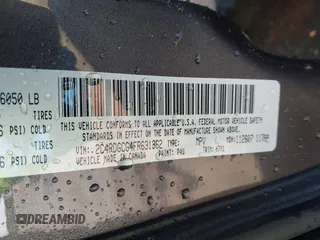 2015 Dodge Grand Caravan SXT with VIN 2C4RDGCG4FR631362, listed as a IAAI auction lot 42027066 with 149,599 mi miles and . Bid and sale history available at DreamBid. Image 9.