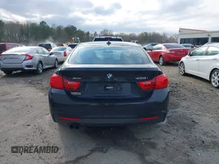 2016 BMW 4 Series 428i xDrive with VIN WBA4C9C52GG136584, listed as a IAAI auction lot 41530110 with 124,667 mi miles and . Bid and sale history available at carsss.com. Image 16.