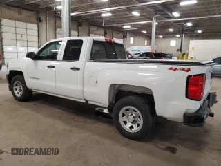 2019 Chevrolet Silverado 1500 Work Truck with VIN 2GCVKNEC2K1205861, listed as a Copart auction lot 51672785 with 104,733 mi miles and Salvage Title. Bid and sale history available at DreamBid. Image 2.