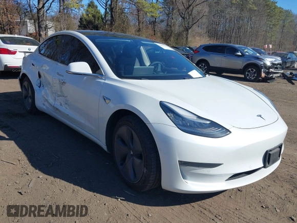 2020 Tesla Model 3 Standard Range Plus with VIN 5YJ3E1EA0LF783672, listed as a IAAI auction lot 41903431 with 52,157 mi miles and . Bid and sale history available at carsss.com. Image 1.