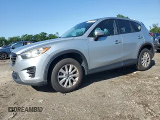 2016 Mazda CX-5 Sport z VIN JM3KE2BE8G0762363, wystawiony jako Copart lot #60873715 z przebiegiem 154 756 mil mil oraz Czysty tytuł • Clean title. Historia ofert i sprzedaży dostępna na DreamBid. Obrazek 1.