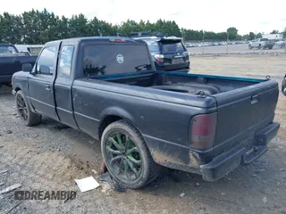 1994 Ford Ranger Splash z VIN 1FTCR14U9RTA81159, wystawiony jako IAAI lot #42659217 z przebiegiem 300 000 mil mil oraz . Historia ofert i sprzedaży dostępna na DreamBid. Obrazek 3.