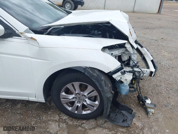 2012 Honda Accord Sdn SE with VIN 1HGCP2F61CA219646, listed as a IAAI auction lot 41877399 with 176,935 mi miles. Bid and sale history available at carsss.com. Image 18.