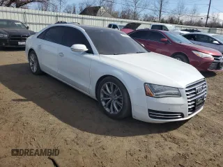 2014 Audi A8 3.0T z VIN WAURGAFD5EN007438, wystawiony jako Copart lot #47979945 z przebiegiem 147 236 mil mil oraz Szkody całkowita. Historia ofert i sprzedaży dostępna na DreamBid. Obrazek 4.