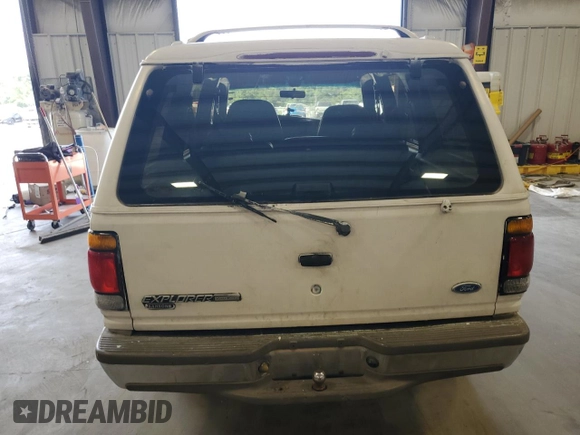 1996 Ford Explorer XL with VIN 1FMDU32X6TUD64045, listed as a Copart auction lot 65942264 with 138,750 mi miles and Salvage title. Bid and sale history available at DreamBid. Image 6.
