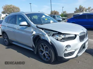 2019 BMW X1 xDrive28i with VIN WBXHT3C56K5L38658, listed as a IAAI auction lot 42496734 with 49,373 mi miles and . Bid and sale history available at DreamBid. Image 6.