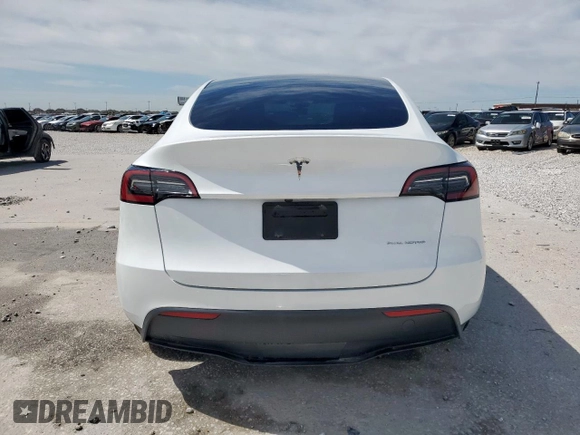 2024 Tesla Model Y Long Range z VIN 7SAYGDEE0RA313929, wystawiony jako Copart lot #59548725 z przebiegiem Nie podano mil oraz Szkoda całkowita • Salvage title. Historia ofert i sprzedaży dostępna na DreamBid. Obrazek 6.