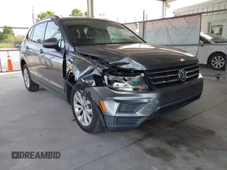 2018 Volkswagen Tiguan S with VIN 3VV1B7AX5JM052288, listed as a IAAI auction lot 42593264 with 143,029 mi miles and . Bid and sale history available at DreamBid. Image 1.