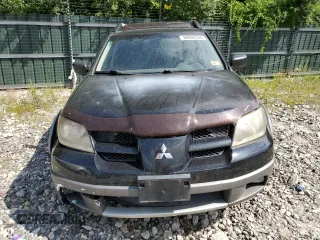 2003 Mitsubishi Outlander XLS with VIN JA4LZ41G03U033545, listed as a Copart auction lot 68009764 with 155,548 mi miles and Salvage Title. Bid and sale history available at carsss.com. Image 5.