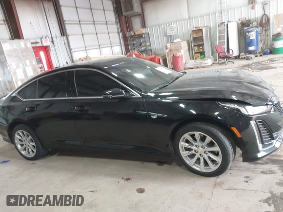 2021 Cadillac CT5 Luxury z VIN 1G6DX5RK0M0147667, wystawiony jako IAAI lot #41398726 z przebiegiem 50 387 mil mil oraz . Historia ofert i sprzedaży dostępna na DreamBid. Obrazek 13.