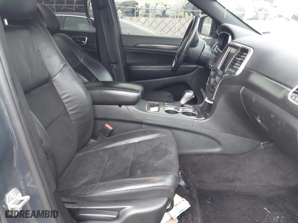 2018 Jeep Grand Cherokee Laredo E with VIN 1C4RJFAG0JC267822, listed as a IAAI auction lot 40876905 with 136,491 mi miles. Bid and sale history available at carsss.com. Image 5.