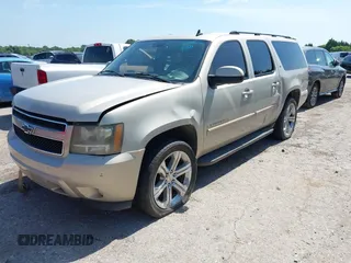 2007 Chevrolet Suburban LS with VIN 1GNFC16087J218794, listed as a IAAI auction lot 42700630 with 262,428 mi miles and . Bid and sale history available at DreamBid. Image 2.