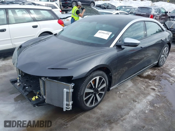2023 Lucid Air Grand Touring z VIN 50EA1GBA6PA005316, wystawiony jako IAAI lot #41591359 z przebiegiem 4571 mil mil oraz . Historia ofert i sprzedaży dostępna na DreamBid. Obrazek 2.