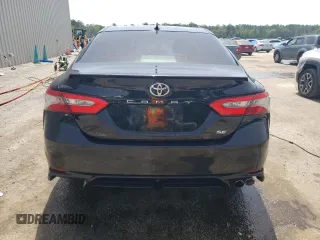 2018 Toyota Camry LE с VIN 4T1B11HKXJU656262, выставлен на аукционе Copart как лот 57132965 с пробегом 106 876 миль миль и Списание • Salvage title. История ставок и продаж доступна на DreamBid. Изображение 6.