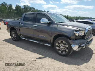 2013 Toyota Tundra z VIN 5TFEM5F13DX060407, wystawiony jako Copart lot #56906595 z przebiegiem 226 651 mil mil oraz Szkoda całkowita • Salvage title. Historia ofert i sprzedaży dostępna na DreamBid. Obrazek 4.