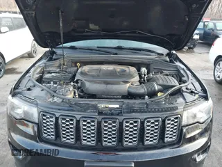 2019 Jeep Grand Cherokee Laredo E with VIN 1C4RJFAG4KC608897, listed as a IAAI auction lot 41771603 with 106,525 mi miles and . Bid and sale history available at DreamBid. Image 10.