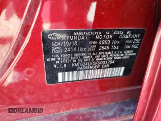 2019 Genesis G70 Advanced with VIN KMTG34LE5KU031794, listed as a Copart auction lot 56139885 with 34,873 mi miles and Salvage title. Bid and sale history available at DreamBid. Image 12.