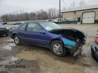 1996 Ford Thunderbird LX with VIN 1FALP6244TH118429, listed as a Copart auction lot 47677935 with 167,726 mi miles and Salvage Title. Bid and sale history available at carsss.com. Image 4.