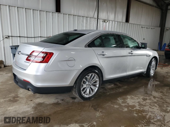 2014 Ford Taurus Limited z VIN 1FAHP2F82EG115503, wystawiony jako Copart lot #64836755 z przebiegiem 111 691 mil mil oraz Szkoda całkowita • Salvage title. Historia ofert i sprzedaży dostępna na DreamBid. Obrazek 3.