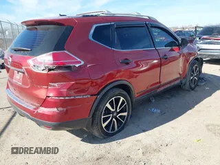 2016 Nissan Rogue S with VIN KNMAT2MT0GP629321, listed as a IAAI auction lot 41328586 with 192,994 mi miles and . Bid and sale history available at DreamBid. Image 4.
