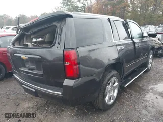2015 Chevrolet Tahoe LTZ with VIN 1GNSCCKC7FR576236, listed as a IAAI auction lot 40794643 with 170,040 mi miles. Bid and sale history available at carsss.com. Image 4.