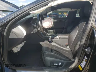 2020 BMW 8 Series M850i z VIN WBAGV8C08LCD46679, wystawiony jako Copart lot #56163785 z przebiegiem Nie podano mil oraz Czysty tytuł • Clean title. Historia ofert i sprzedaży dostępna na DreamBid. Obrazek 7.