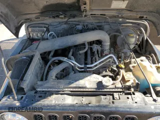 2004 Jeep Wrangler Sport with VIN 1J4FA49S04P751464, listed as a Copart auction lot 61686865 with Not provided miles and Salvage title. Bid and sale history available at DreamBid. Image 11.
