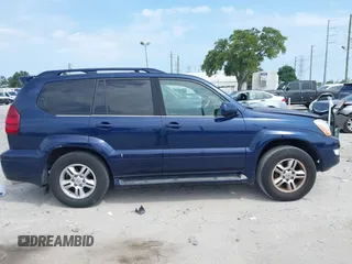 2007 Lexus GX 470 z VIN JTJBT20X270127591, wystawiony jako IAAI lot #42273144 z przebiegiem 191 240 mil mil oraz . Historia ofert i sprzedaży dostępna na DreamBid. Obrazek 13.