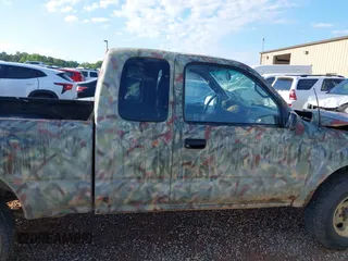 1999 Toyota Tacoma z VIN 4TAWM72N5XZ429880, wystawiony jako IAAI lot #42179697 z przebiegiem 311 261 mil mil oraz . Historia ofert i sprzedaży dostępna na DreamBid. Obrazek 13.