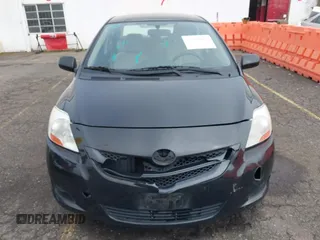 2008 Toyota Yaris with VIN JTDBT903284012329, listed as a IAAI auction lot 41879489 with 117,041 mi miles. Bid and sale history available at carsss.com. Image 6.