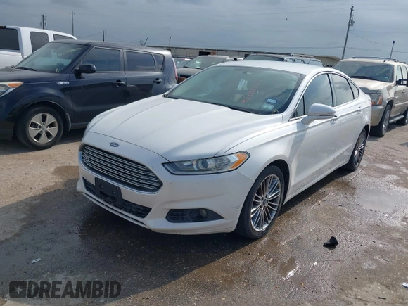 2014 Ford Fusion SE with VIN 3FA6P0HD8ER169211, listed as a IAAI auction lot 42038877 with 215,769 mi miles. Bid and sale history available at carsss.com. Image 2.
