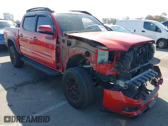 2018 Toyota Tacoma SR5 with VIN 3TMAZ5CN2JM067292, listed as a IAAI auction lot 41851959 with 70,988 mi miles and . Bid and sale history available at DreamBid. Image 1.