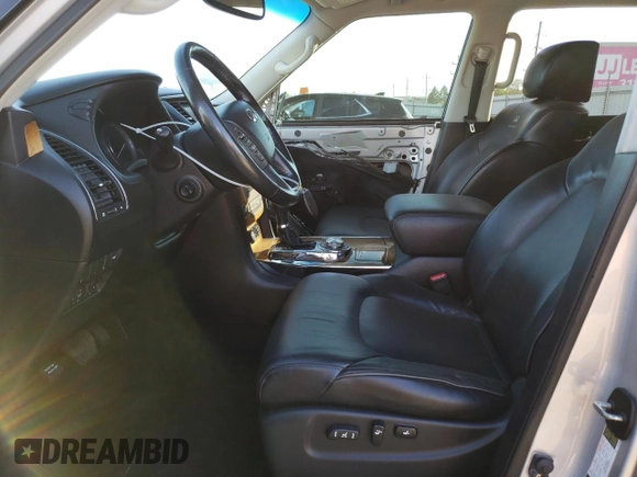 2011 Infiniti QX56 7-passenger with VIN JN8AZ2NE0B9005454, listed as a Copart auction lot 73222904 with 143,449 mi miles and Salvage Title. Bid and sale history available at carsss.com. Image 7.