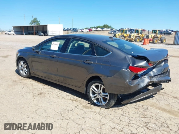 2018 Ford Fusion SE z VIN 3FA6P0H71JR155221, wystawiony jako IAAI lot #42145081 z przebiegiem 189 367 mil mil oraz . Historia ofert i sprzedaży dostępna na DreamBid. Obrazek 3.