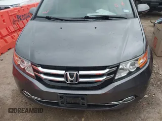 2016 Honda Odyssey Touring Elite with VIN 5FNRL5H96GB063176, listed as a IAAI auction lot 42157604 with 106,177 mi miles. Bid and sale history available at carsss.com. Image 12.