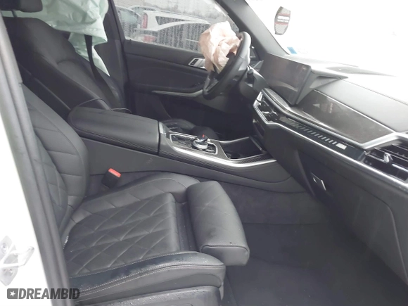 2025 BMW X5 M60i with VIN 5UX33EU03S9X72579, listed as a IAAI auction lot 41502125 with 7,167 mi miles. Bid and sale history available at carsss.com. Image 5.