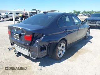 2013 BMW 3 Series 328i with VIN WBA3A5C59DF350824, listed as a IAAI auction lot 42206371 with Not provided miles and . Bid and sale history available at DreamBid. Image 4.