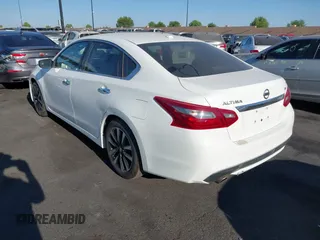 2018 Nissan Altima 2.5 S with VIN 1N4AL3AP8JC254733, listed as a IAAI auction lot 40212001 with 148,347 mi miles. Bid and sale history available at carsss.com. Image 3.
