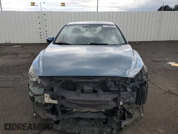 2016 Mazda 3 i Touring with VIN JM1BM1W71G1285237, listed as a Copart auction lot 71208844 with 94,534 mi miles and Salvage Title. Bid and sale history available at DreamBid. Image 5.