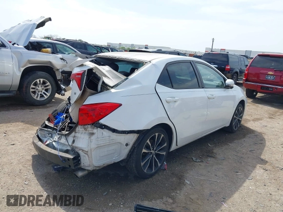 2019 Toyota Corolla L with VIN 5YFBURHE8KP901272, listed as a IAAI auction lot 42031180 with 117,932 mi miles and . Bid and sale history available at DreamBid. Image 4.