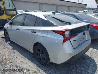2022 Toyota Prius L Eco with VIN JTDKAMFU8N3164240, listed as a IAAI auction lot 41892462 with 35,980 mi miles. Bid and sale history available at carsss.com. Image 3.
