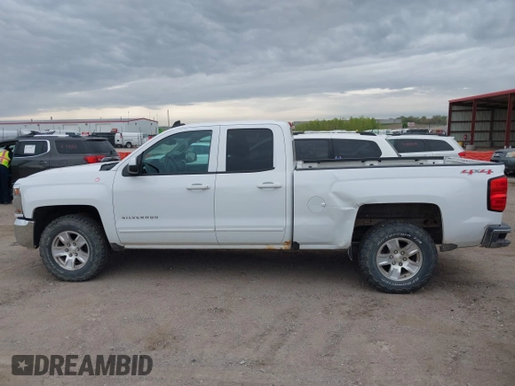 2016 Chevrolet Silverado 1500 LT with VIN 1GCVKREC7GZ338959, listed as a IAAI auction lot 42147778 with 140,570 mi miles and . Bid and sale history available at DreamBid. Image 14.