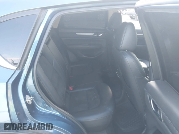 2020 Mazda CX-5 Touring with VIN JM3KFACM0L0775020, listed as a IAAI auction lot 40876970 with 96,424 mi miles. Bid and sale history available at carsss.com. Image 8.