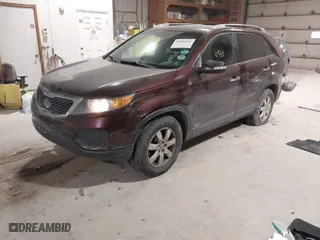 2013 Kia Sorento LX with VIN 5XYKTDA28DG338687, listed as a IAAI auction lot 41506461 with 234,553 mi miles. Bid and sale history available at carsss.com. Image 2.