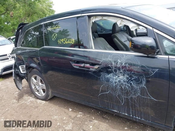 2012 Honda Odyssey Touring with VIN 5FNRL5H91CB121950, listed as a IAAI auction lot 42456620 with 200,831 mi miles and . Bid and sale history available at DreamBid. Image 13.