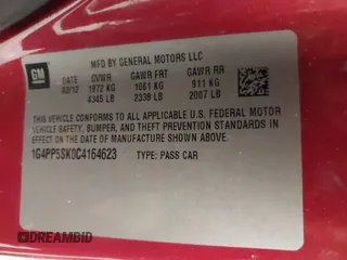 2012 Buick Verano with VIN 1G4PP5SK0C4164623, listed as a IAAI auction lot 41954204 with 122,450 mi miles and . Bid and sale history available at carsss.com. Image 9.