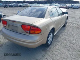 2004 Oldsmobile Alero GL1 z VIN 1G3NL52F14C137772, wystawiony jako IAAI lot #41850374 z przebiegiem 216 956 mil mil oraz . Historia ofert i sprzedaży dostępna na DreamBid. Obrazek 4.