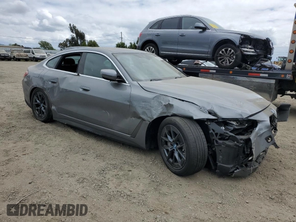2023 BMW i4 eDrive35 z VIN WBY43AW06PFR23434, wystawiony jako Copart lot #54530055 z przebiegiem 16 920 mil mil oraz Szkody całkowita. Historia ofert i sprzedaży dostępna na DreamBid. Obrazek 4.